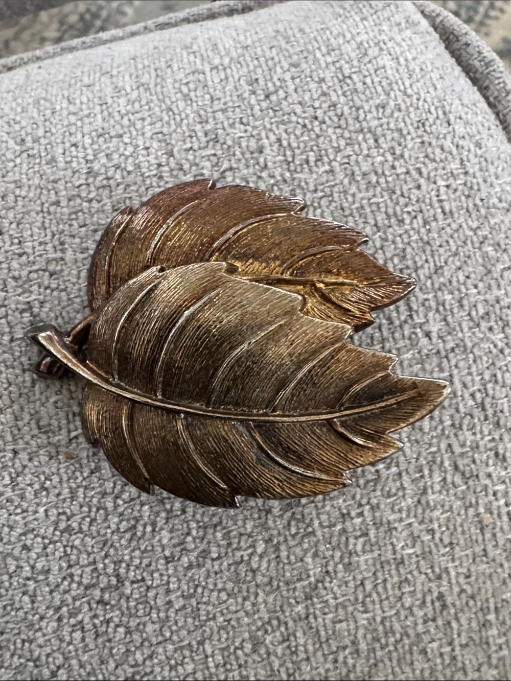 Gold tone, leaf design, metal brooch by Ann Klein
